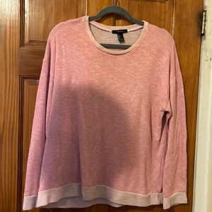 This shirt is a baby pink shirt bought from Brazil and it is a size  large